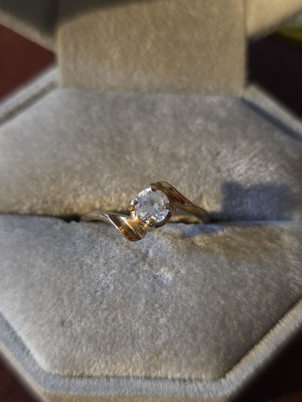 Gold Solitaire Twist Ring with Clear Stone